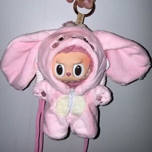 Adorable Pink Plush Bunny outfit for Labubu with carrying strap.